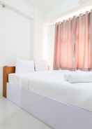 BEDROOM Pleasant 2BR Green Pramuka City Apartment Direct Access to Mall By Travelio