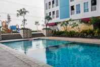 Swimming Pool Comfy Cozy Studio Room Grand Dhika Apartment By Travelio