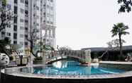 Kolam Renang 5 Minimalist and Close to Pool Studio Apartment Sky Terrace at Daan Mogot Baru By Travelio