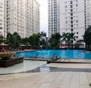 Swimming Pool 3 Comfortable Studio Green Palace Kalibata Apartment By Travelio