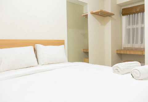 Bedroom Minimalist Style 2BR Apartment at Parahyangan Residence By Travelio