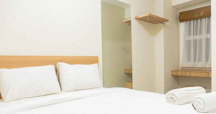 Bedroom Minimalist Style 2BR Apartment at Parahyangan Residence By Travelio
