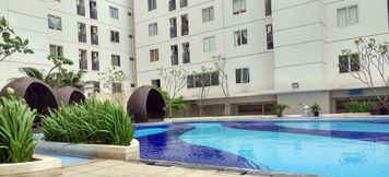 Lobby 3 Simply 1BR with Sofa Bed at Bassura City Apartment By Travelio