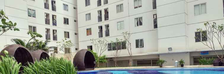 Lobby Simply 1BR with Sofa Bed at Bassura City Apartment By Travelio