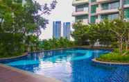 Kolam Renang 5 Luxury and Exclusive 2BR St. Moritz Puri Apartment with Private Lift By Travelio