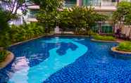 Swimming Pool 4 Luxury and Exclusive 2BR St. Moritz Puri Apartment with Private Lift By Travelio