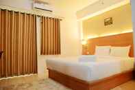 Kamar Tidur Cozy Studio Room @ Annora Living Apartment Tangerang By Travelio