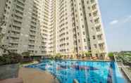 Swimming Pool 5 Brand New 2BR Parahyangan Residence Apartment By Travelio