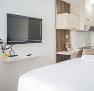 Bedroom 2 Cozy Apartment at Emerald Bintaro Studio near British International School By Travelio