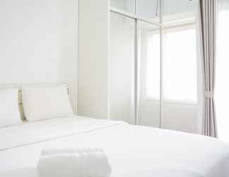 Bedroom 2 Cozy Apartment at Emerald Bintaro Studio near British International School By Travelio