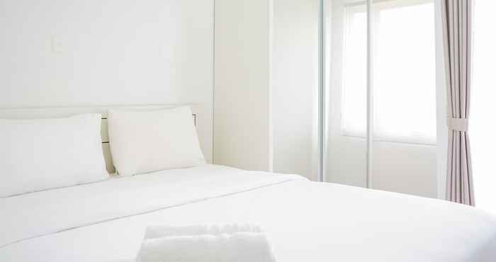 Bedroom Cozy Apartment at Emerald Bintaro Studio near British International School By Travelio