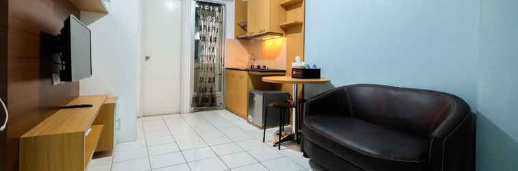 Lobby Minimalist and Homey 2BR Apartment at Kalibata City By Travelio
