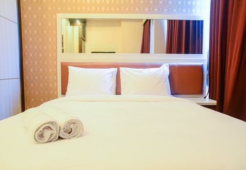 침실 Comfortable Studio at Capitol Park Apartment By Travelio