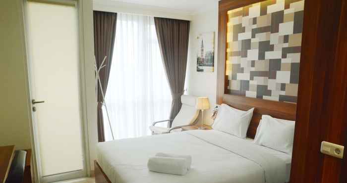 Bedroom Warm and Clean Studio Menteng Park Apartment By Travelio