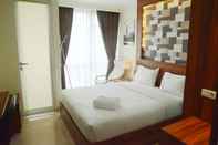 Bedroom Warm and Clean Studio Menteng Park Apartment By Travelio
