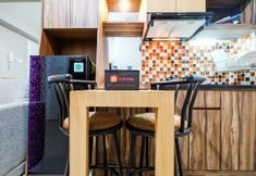 Common Space 3 Classic and Comfy 2BR Bassura City Apartment By Travelio