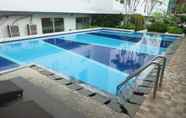 Swimming Pool 6 Modern and Pleasant 3BR Bassura City Apartment By Travelio