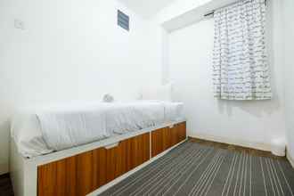 Bilik Tidur 4 Modern and Pleasant 3BR Bassura City Apartment By Travelio