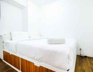 Bedroom 2 Modern and Pleasant 3BR Bassura City Apartment By Travelio