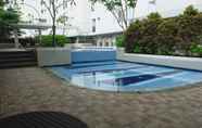 Swimming Pool 5 Modern and Pleasant 3BR Bassura City Apartment By Travelio