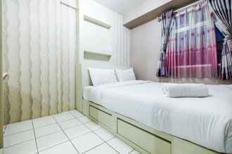 Bedroom 4 Homey and Cozy 2BR Kalibata City Apartment By Travelio