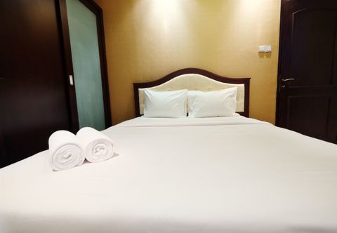 침실 Relax Bellagio Apartment 2BR near Kuningan City By Travelio