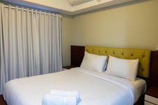 臥室 Relaxing 2BR with City View The Wave Apartment By Travelio