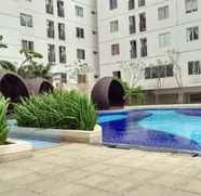 Kolam Renang 3 Luxury and Modern 3BR Bassura City Apartment near Shopping Center By Travelio