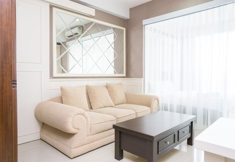 Common Space Clean and Lavish Design 1BR Dago Suites Apartment By Travelio