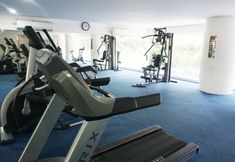 Fitness Center 7 Clean and Lavish Design 1BR Dago Suites Apartment By Travelio