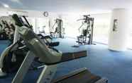 Fitness Center 7 Clean and Lavish Design 1BR Dago Suites Apartment By Travelio