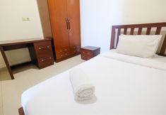 Bedroom 2 Spacious and Nice 2BR Bellezza Apartment By Travelio