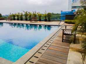 Kolam Renang 4 Tree Park Comfort Studio Apartment near ICE BSD By Travelio