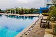 Swimming Pool Tree Park Comfort Studio Apartment near ICE BSD By Travelio