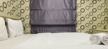 Bedroom 2 Comfortable 1BR Pancoran Riverside Apartment near Kalibata City By Travelio