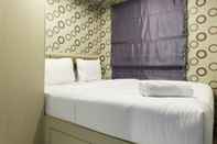 Kamar Tidur Comfortable 1BR Pancoran Riverside Apartment near Kalibata City By Travelio