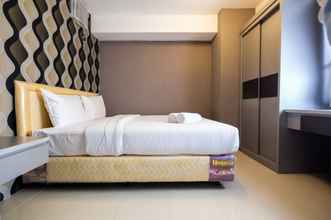 Bedroom 4 Modern and Comfy 2BR Bassura City Apartment By Travelio