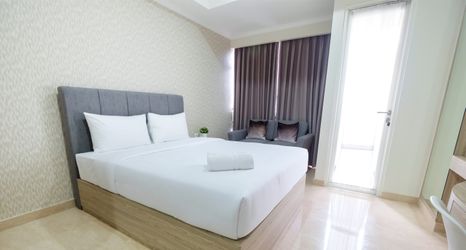 寝室 2 Comfort Studio Menteng Park Apartment By Travelio