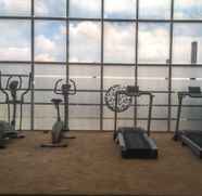 Fitness Center 5 Comfy Premiere 1BR at The Oasis Apartment By Travelio