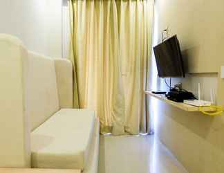 Lobi 2 Comfy Premiere 1BR at The Oasis Apartment By Travelio