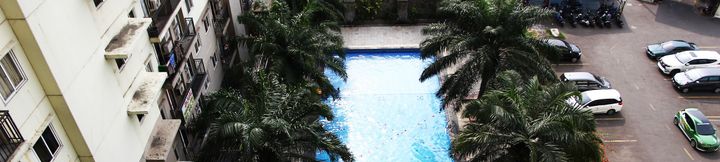 Swimming Pool 4 Clean 2BR with Pool View Mutiara Bekasi Apartment By Travelio