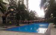 Kolam Renang 3 Clean 2BR with Pool View Mutiara Bekasi Apartment By Travelio