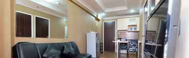 Sảnh chờ 2 Relaxing and Pleasant 2BR with Pool View Mutiara Bekasi Apartment By Travelio