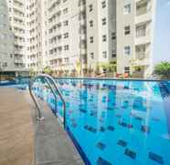 Swimming Pool 2 Compact and Clean 2BR with Sofa Bed at Parahyangan Residence By Travelio