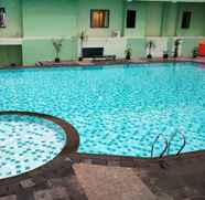 Swimming Pool 3 Warm and Comfortable 1BR Menteng Square Apartment By Travelio