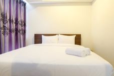 Bilik Tidur Best Location and Cozy 2BR The H Residence Apartment By Travelio