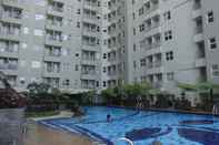 Lobi Modern and Clean 1BR Apartment Near Cihampelas at Parahyangan Residence By Travelio