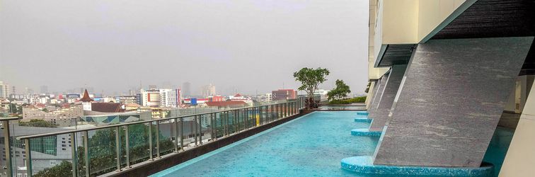 Lobby Cozy and Pleasant Studio Menteng Park Apartment By Travelio