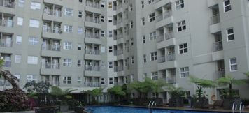 Hồ bơi 5 Cozy 2BR Apartment with Direct Access to Pool at Parahyangan Residence By Travelio