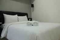 ห้องนอน Cozy 2BR Apartment with Direct Access to Pool at Parahyangan Residence By Travelio